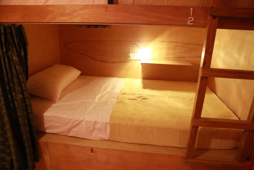 Gibbon Guesthouse Kuching Rom bilde